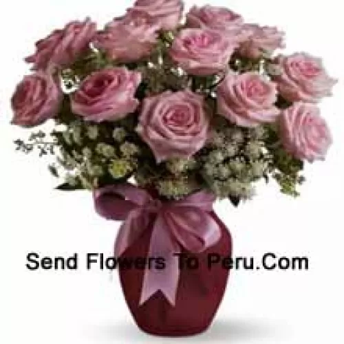 12 Pink Roses With Assorted White Fillers In A Glass Vase