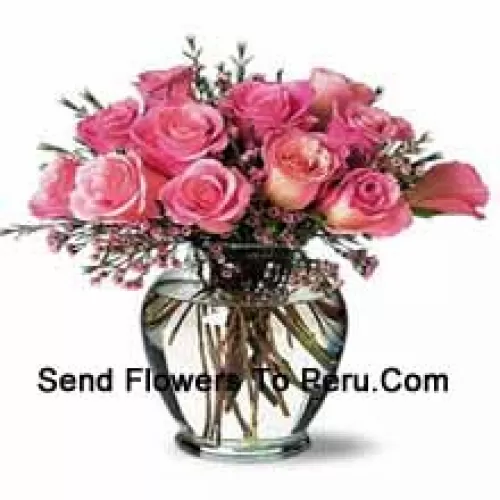 12 Pink Roses With Some Ferns In A Vase