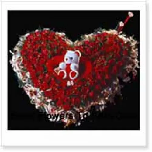 Heart Shaped Arrangement Of 100 Red Roses and a Teddy Bear